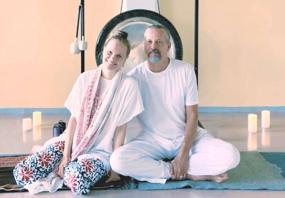 two yoga teachers with a gong